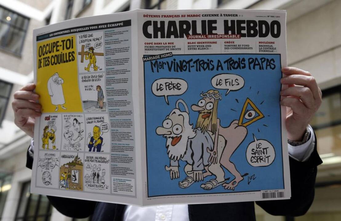 Išpuolis Paryžiuje – dėl karikatūros