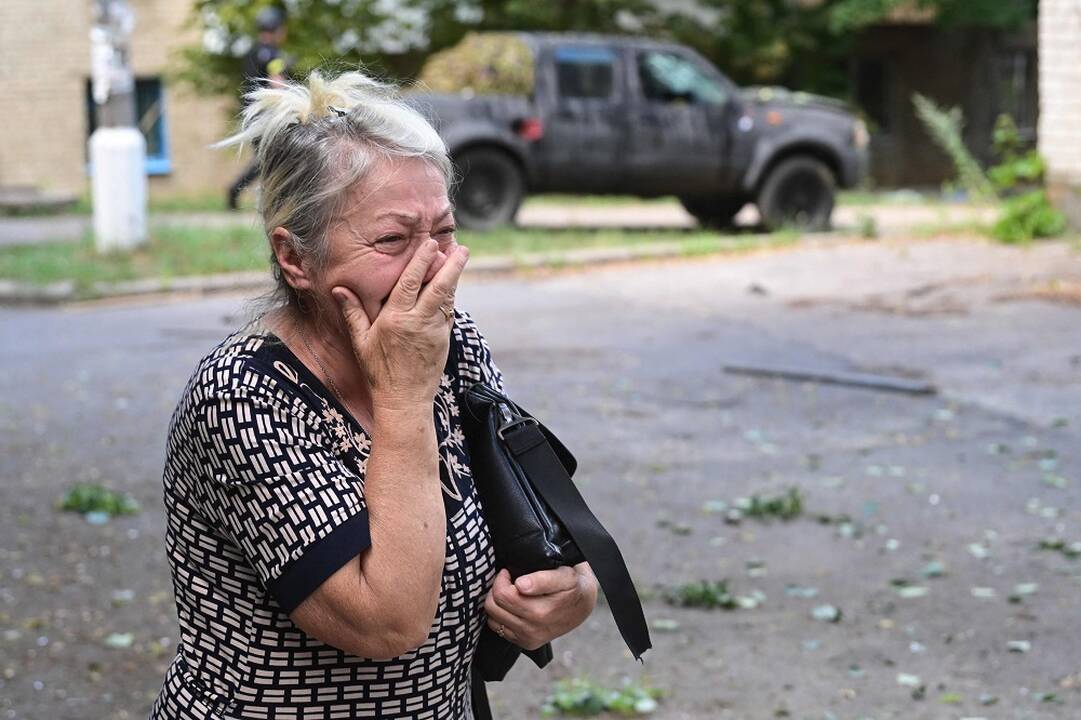 Rusų kariai pelnosi iš mariupoliečių: lavonus ekshumuoja tik už pinigus