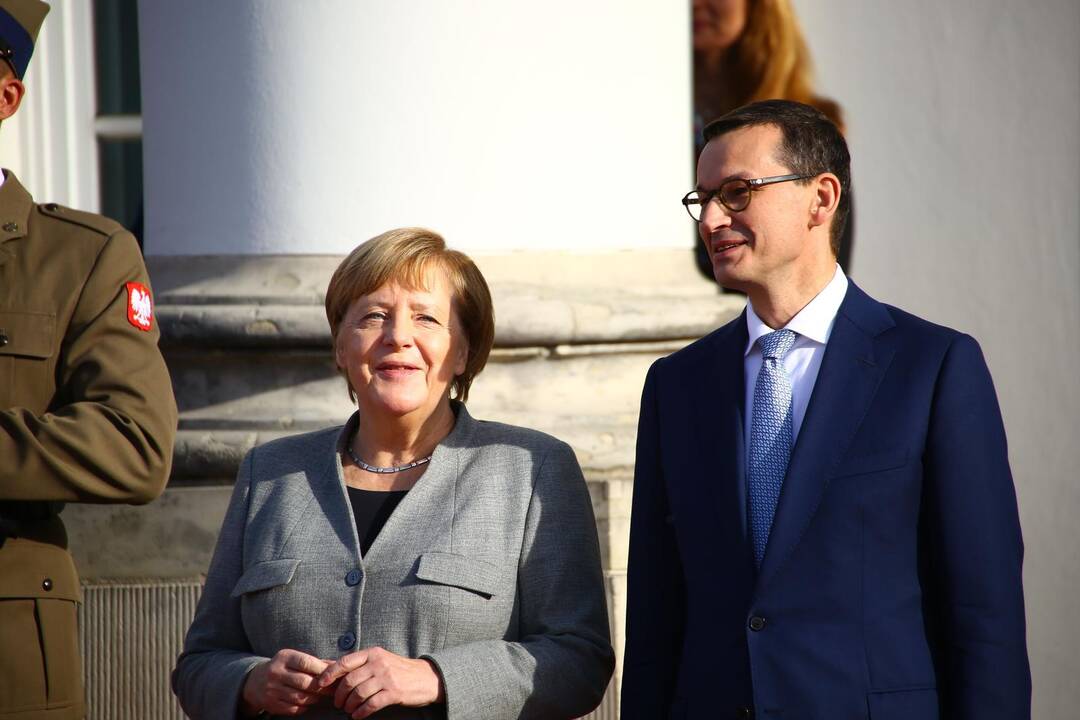 Angela Merkel ir  Mateuszas Morawieckis