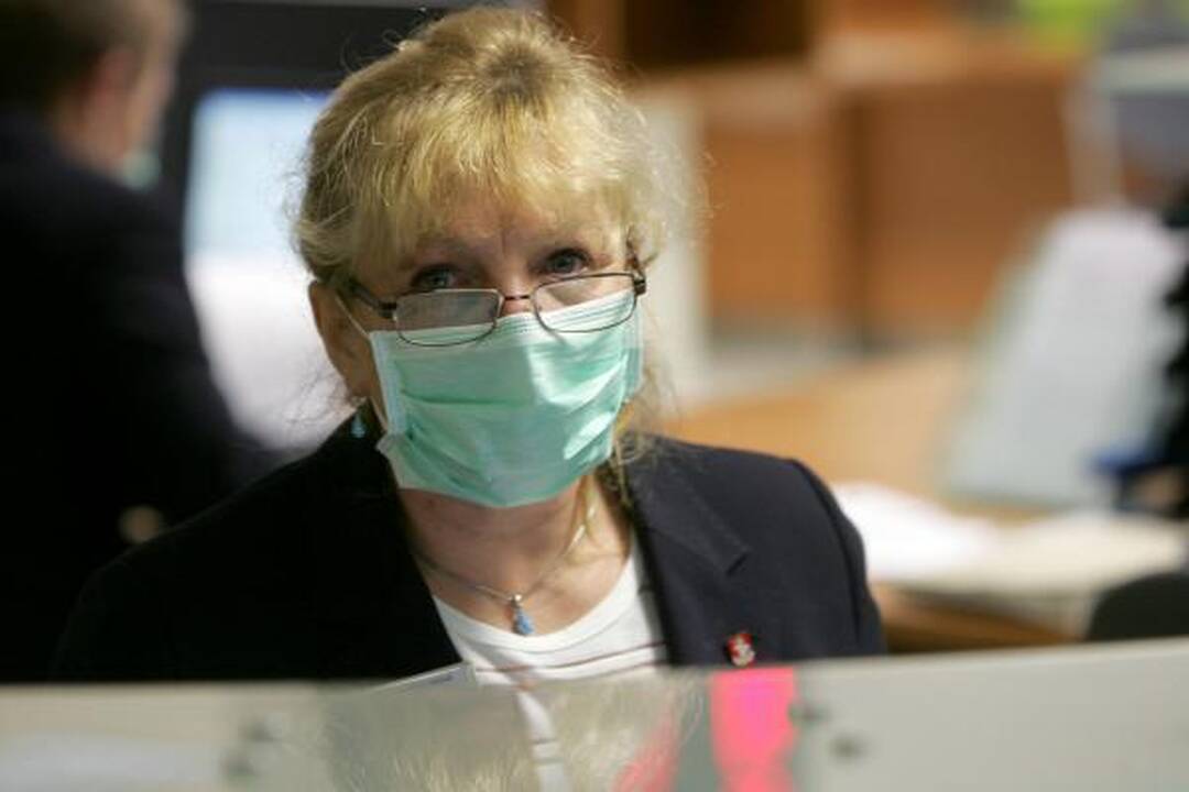 Nuo gripo epidemijos savivaldybė pasislėpė po kaukėmis