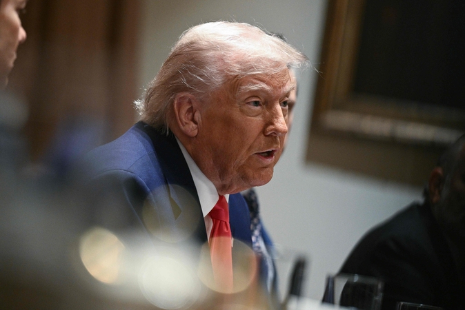 Trumpas sako manantis, kad pavyks išspręsti ginčą su Kinija