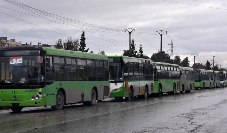Sirijos sukilėliai pagal susitarimą palieka Alepą